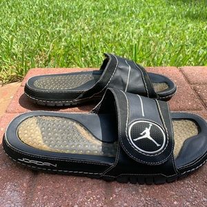 Air Jordan black slides preowned slight wear, Velcro adjustable strap